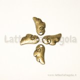 Charm ala kawaii in metallo color bronzo 15x7x0.5mm