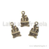 Charm castello in metallo color bronzo 20x10mm