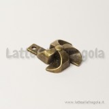 Ciondolo girandola in metallo color bronzo 26x22mm