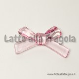 Connettore Fiocco in plastica rosa trasparente foro passante 34x20mm