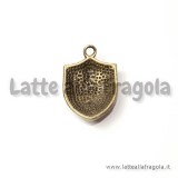 Ciondolo Scudo decorazioni in rilievo in metallo color bronzo 21x14mm