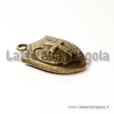 Ciondolo Scudo decorazioni in rilievo in metallo color bronzo 21x14mm
