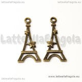 Ciondolo double-face Torre Eiffel e stella in metallo color bronzo 29x13mm