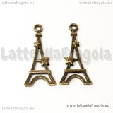 Ciondolo double-face Torre Eiffel e stella in metallo color bronzo 29x13mm