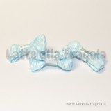 Fiocco azzurro a pois bianchi in poliestere e raso 30x15mm